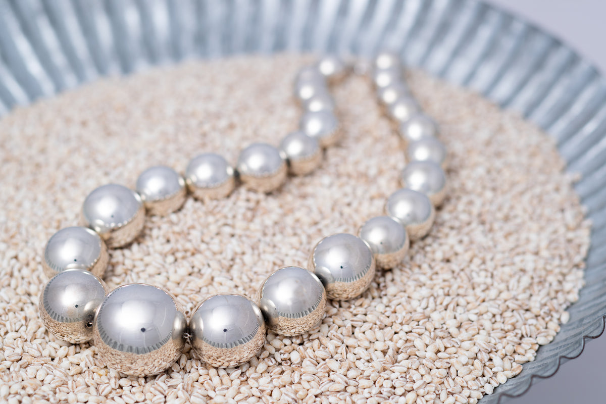 Long silver beaded necklace on sale